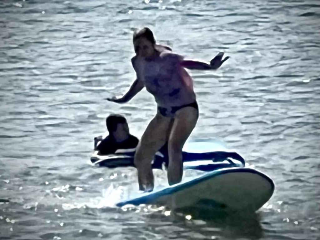 Elisabeth Galperin surfing for the first time
