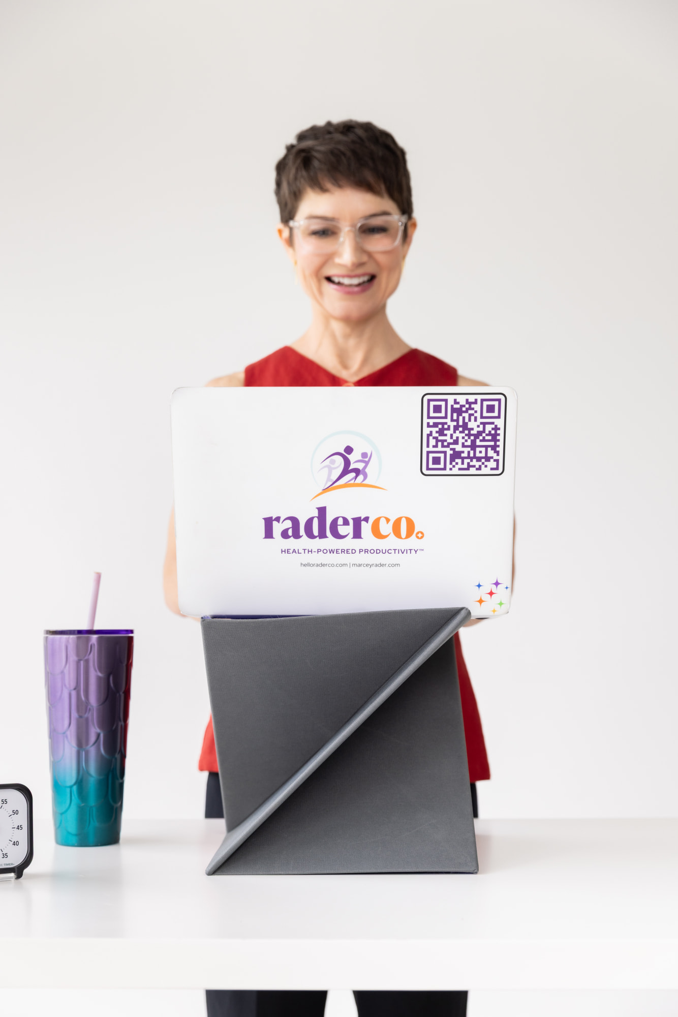 Marcey-Rader-Smiling-Standing-Desk Marcey Coffee