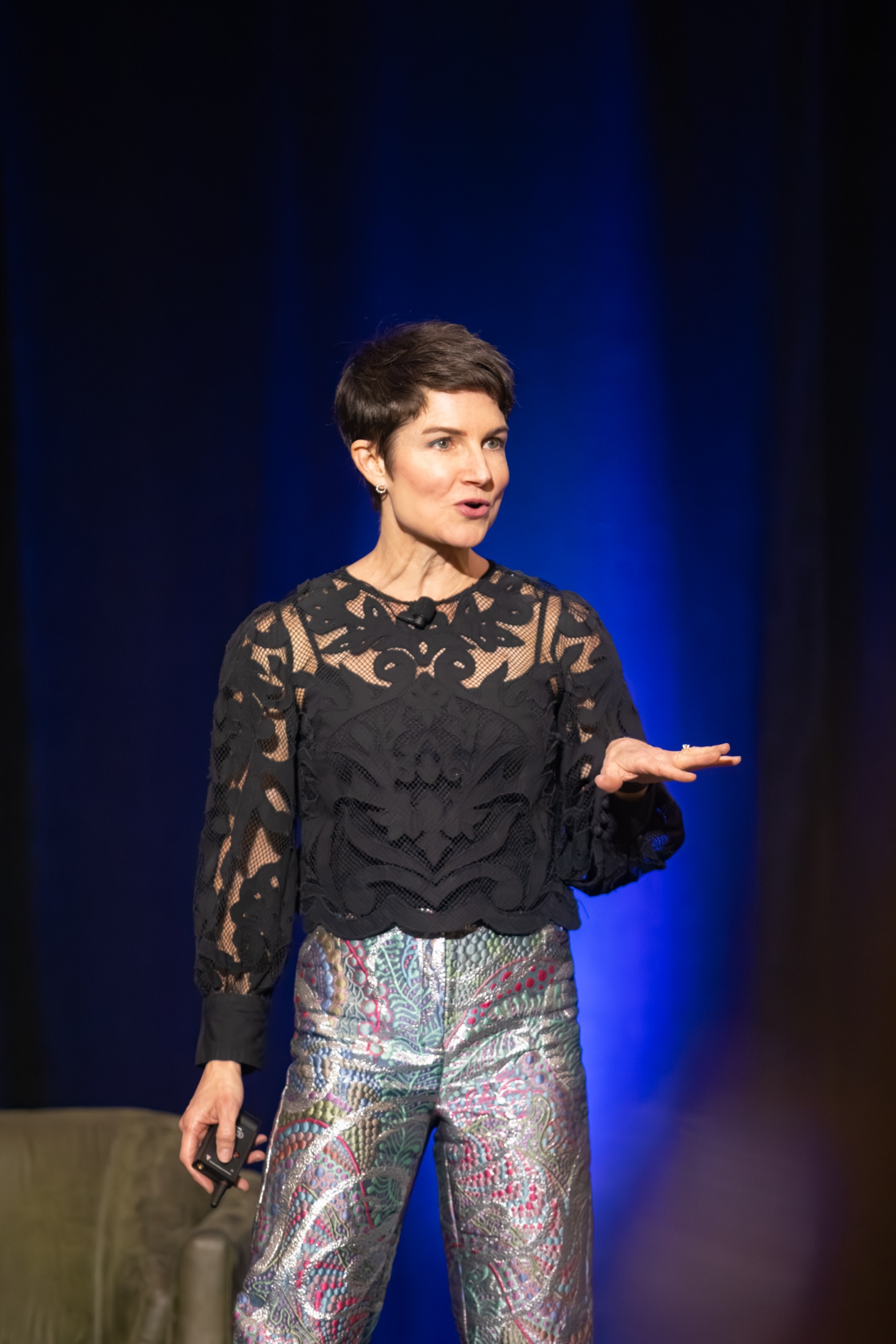 marcey-rader-speaking-accountants-nashville-20260508 Suit standing on stage